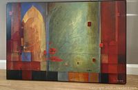 Front view of the abstract painting highlighting its color palette, geometric and floral elements, and artist signature.