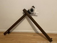 Overview of the wooden Vemco drafting table arm showing the V-Track structure and attachment hardware.