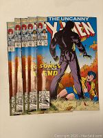 Five issues of The Uncanny X-Men comics with visible front covers from issue 427 to 431.