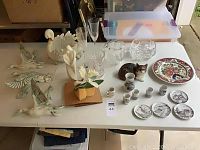 Full view of 23-piece home decor assortment on white table showing all items spread out