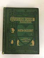 Front cover green hardcover with gold and black embossed text and design details on The Works of Charles Dickens Household Edition Martin Chuzzlewit