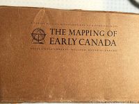 Brown folder cover with title The Mapping of Early Canada and company details.