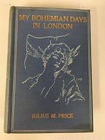 Front cover of the vintage book showing title and gold embossed illustration on blue cloth binding.