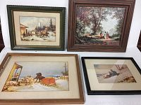 Four framed prints arranged showing winter and outdoor scenes, mostly 19th-20th century style, in assorted wooden frames with glass and mats.