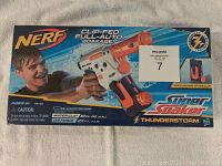 Front view of the unopened Nerf Thunderstorm Super Soaker box showing product details and branding
