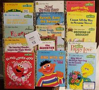 Photo showing 15 Little Golden Books featuring Sesame Street and Muppet characters arranged facing forward, titles visible.