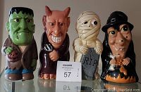 All four Dynagood Halloween blow molds together: Frankenstein's monster, devil, mummy, and witch.