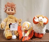 Front view of three Wonder Whims plush soft sculptures: whimsie character, seagull, and ram, all soft and clean.