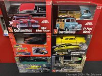 Lot showing all five plastic model kits stacked vertically. Kits include 1958 Edsel Pacer, 1941 Ford Woody, 1934 Ford Street Rod, 1968 Dodge Charger Bullitt, and 1956 Chrysler 300C.
