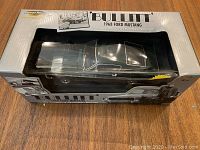 Front view of boxed car showing overall condition of packaging and car