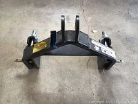 Side angled view showing the hitch attachment with bolts on either side and Josco branding visible on metal frame.