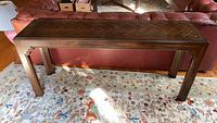 Full view of Henredon solid wood console table showing rectangular top with herringbone inlay and four straight legs.