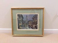 Framed watercolor painting showing an 11x14 inch original artwork titled 'PARIS Place Vendome' featuring Paris street scene at night with buildings, street lamps, and a column.