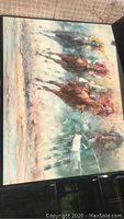 Full view of the acrylic horse race painting showing several horses in motion and jockeys, vibrant colors, signed canvas.