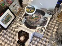 Table overview showing all items in the lot arranged on a plaid tablecloth