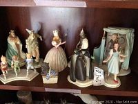 Shelf with all Wizard of Oz figurines