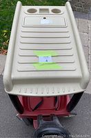 Step 2 canopy wagon top view showing beige plastic canopy with cup holders and storage compartments.