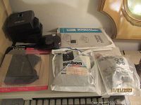 Smith Corona PWP 3800 original accessories including ink ribbons, cleaning wipe, and owner's manual in packaging