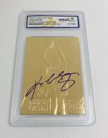 Front of 1996-97 Fleer 23KT Gold Kobe Bryant rookie card with purple signature graded 10 GEM MT in clear protective case.