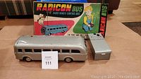 Bus, remote unit and original box displayed together
