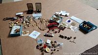 Overview of all jewelry pieces laid out on table