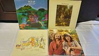 Four vinyl albums front covers showing Ocean - Pt. Richard Alternative, Van Morrison Tupelo Honey, Crosby Stills Nash & Young So Far and another Ocean album