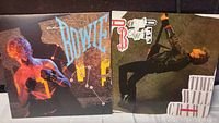 Front covers of two David Bowie vinyl records showing distinct album artwork.