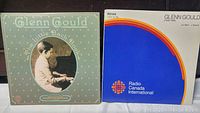 Front covers of two Glenn Gould vinyl albums: "The Little Bach Book" and Radio Canada International