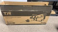 Original packaging box showing TR Industrial logo and model TR89105 TR100 Electric Demolition Hammer