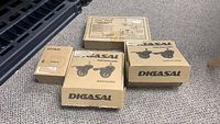 Photo of all boxed items showing Dicasal wheels, Zonkie pedal, Little World training wheels boxes.