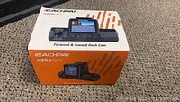 Box of EACHPAI X200 Forward and Inward Dash Cam showing model and features on packaging.