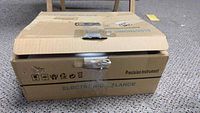 Closed cardboard box labeled Precision Instrument Electronic Balance