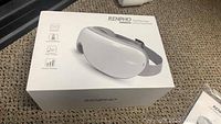 Boxed Renpho RFEM001 Eye Massager showing branding, model, and features on packaging.