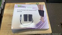 Box of AMZDEAL Air Leg Massager model S9022A showing the product image and model number on packaging.
