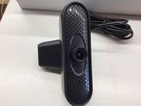 Front view of black USB HD webcam with textured surface and central lens.