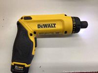 Yellow and black DeWalt screwdriver showing side view with DeWalt branding and 8V Max Lithium Ion sticker on battery pack.