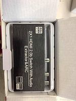 Top view of 4K HDMI 2.0 switch with audio extractor in box