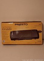 Photo of the Presto Cool Touch Electric Griddle box with product image and specifications on front.
