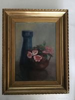 Full view of vintage framed original oil painting showing a blue vase and brown pot with pink flowers.