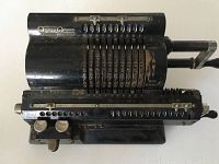 Front perspective view of the calculator showing overall device shape and structure.