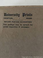 Close-up of back of package labeled 'University Prints Newton Mass.' with postal inspection statement.