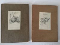 Two hardcover books side by side on a white surface, titles visible as London and York sketch books.