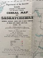 Close-up photo showing title and legend of the cereal map, indicating crop types and data source from 1915 agricultural data for Saskatchewan.