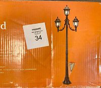 Photo of the box showing the Waterford lamp post with three light heads and black finish.