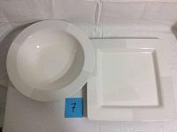 The bowl and plate side by side showing shapes and sizes.