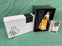 Royal Doulton Pretty Ladies figurine in black satin lined box, with original outer box on side and certificate/plaque nearby.