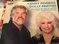 Close-up photo of 45 RPM vinyl single record featuring Kenny Rogers and Dolly Parton duet 'Islands in the Stream'