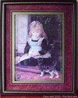 Framed art print showing young girl with cat at her feet in a wine-colored frame with gold pattern.