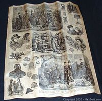 Front view of first Victorian fashion illustration gift wrapping sheet laid flat on dark surface