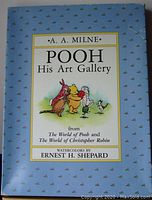 Front cover of the book, showing the title and illustration of Pooh and friends